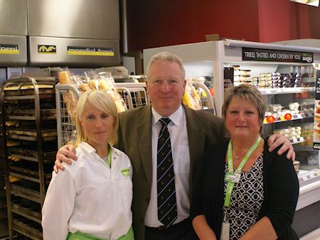 Mike Penning MP at Asda with charity runner Alex Bayliss and People Manager, Eve Warren