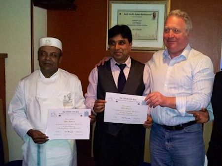 Mike presents chef’s jacket to Saffron Indian Cuisine to commemorate the 'Highly Commended' rating in the Tiffin Cup