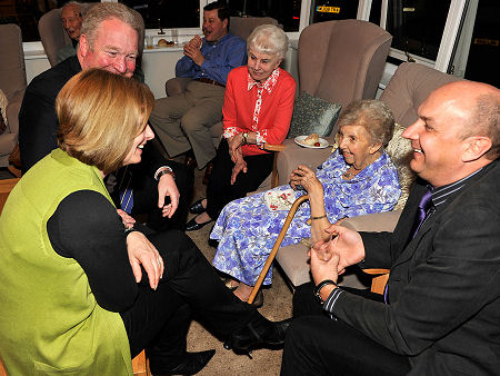 Mike chats to resident, Sylvia Brightley and friends at the opening of the conservatory at Sibley's Orchard