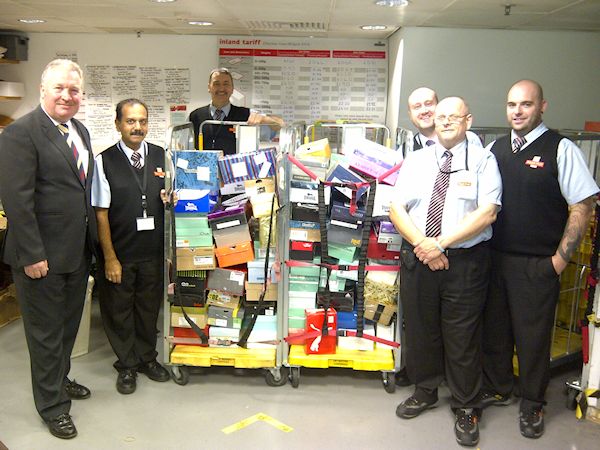 Mike delivers Treats for our Troops parcels to the Post Office sorting office at the Houses of Parliament