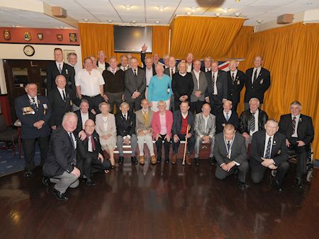 Mike Penning presents badges to forces veterans, 29th March 2012 (photo: Silver Images)