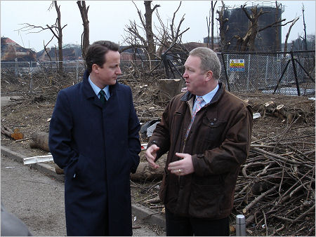 Mike Penning and David Cameron discussing the situation at Buncefield Oil Depot.